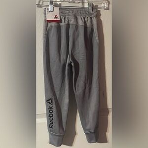 2 pairs of Boy’s Reebok pants. Size (4/5) 
Price‎ includes both pairs of pants.